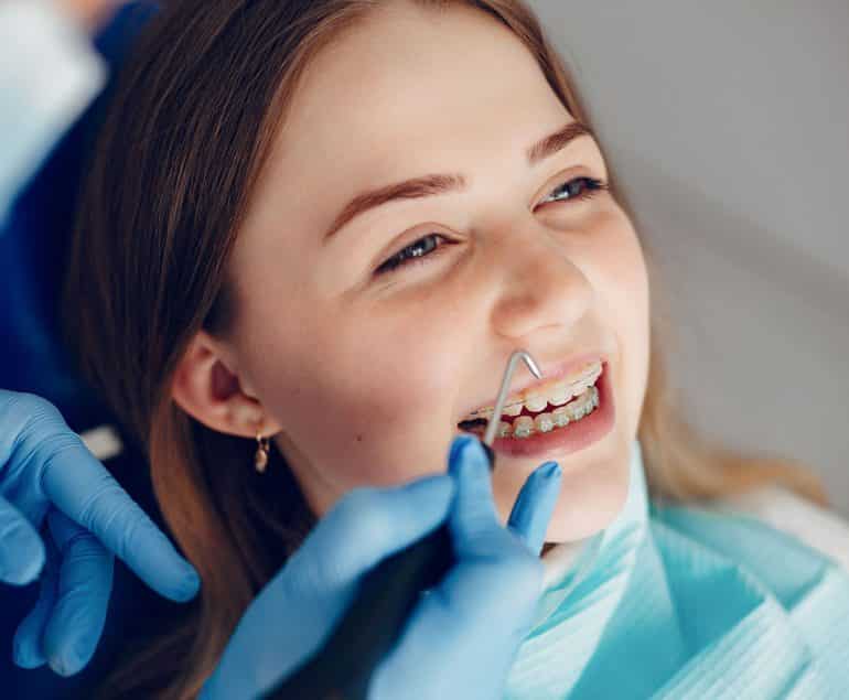 Girl Receiving Orthodontic Treatment in Cairns Dental Clinic